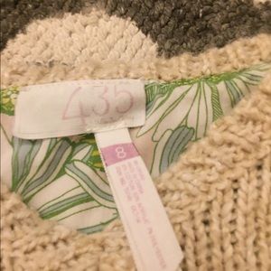 tan sweater